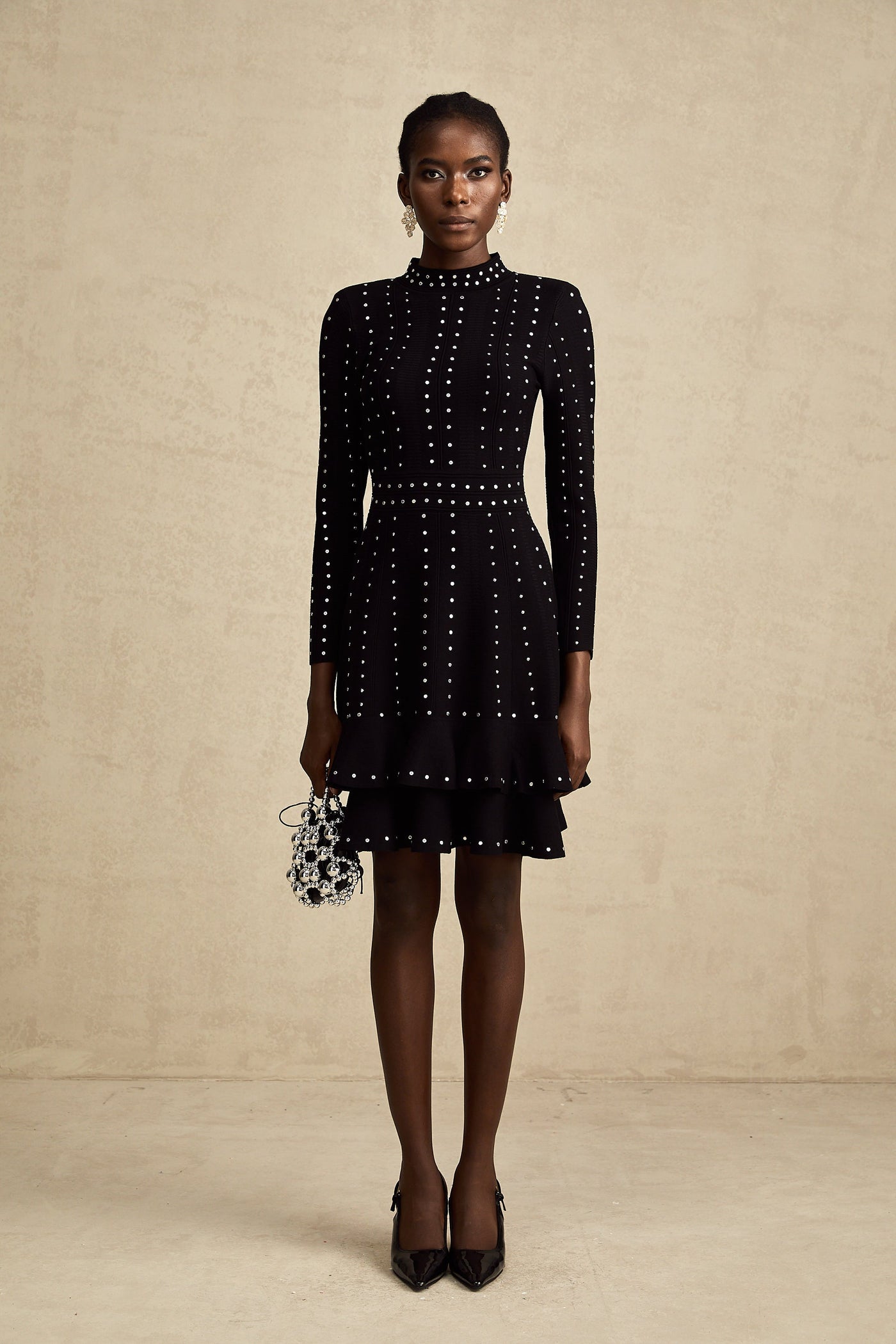 Fabienne black embellished ruffled knitted mini dress