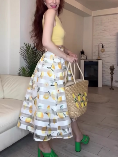 Yellow vest and lemon striped skirt suit